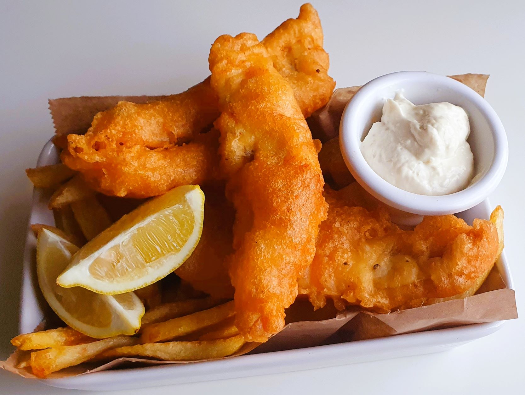 Traditional Homemade British Beer Battered Fish and Chips, with a classic  easy batter recipe